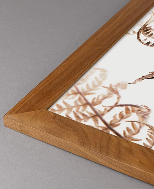 Wooden frames specially tailored to fit the artwork