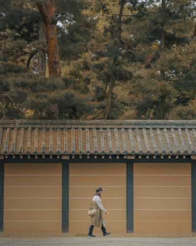 Woman walking around Kyoto palace