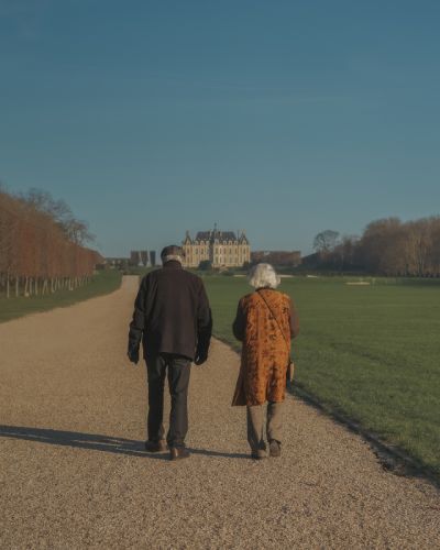 Old couple walking at parc de sceaux